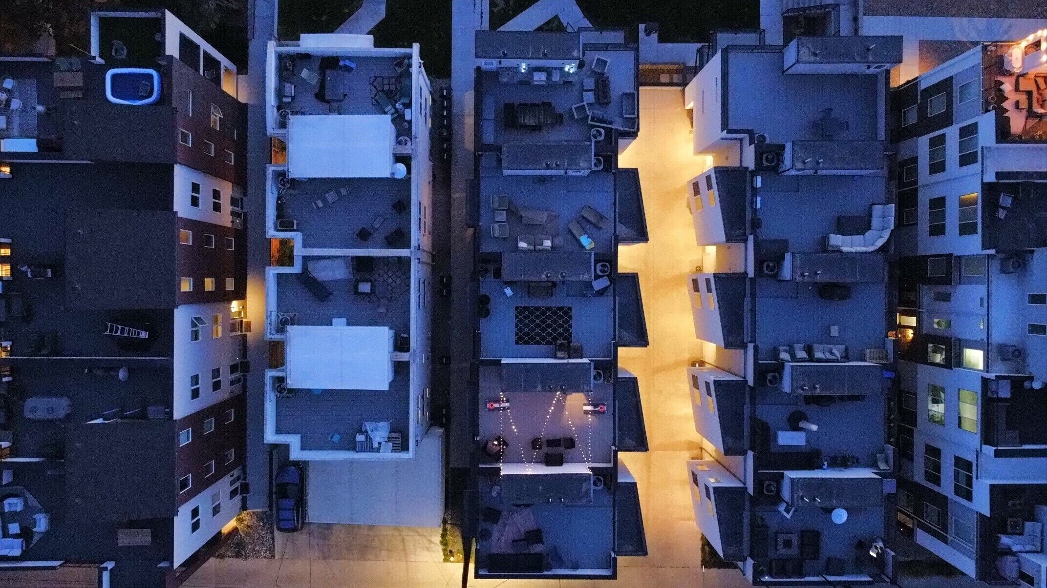 A multi-story hotel with a central courtyard.