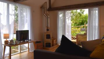 Romantic Cottage, 1 Bedroom | Living area | 35-inch Smart TV with digital channels, TV