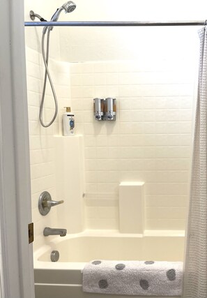 Combined shower/bathtub, hair dryer, towels, soap