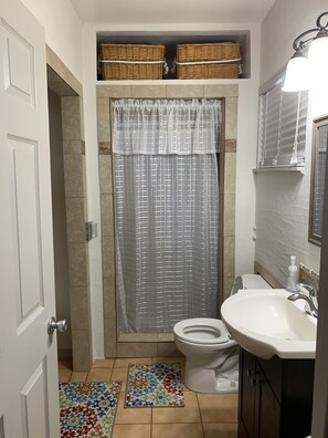 Shower, towels, toilet paper