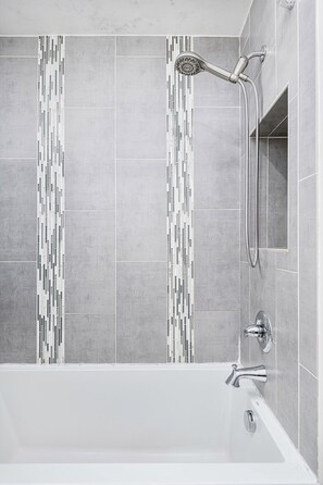 Combined shower/tub, hair dryer, bidet, towels