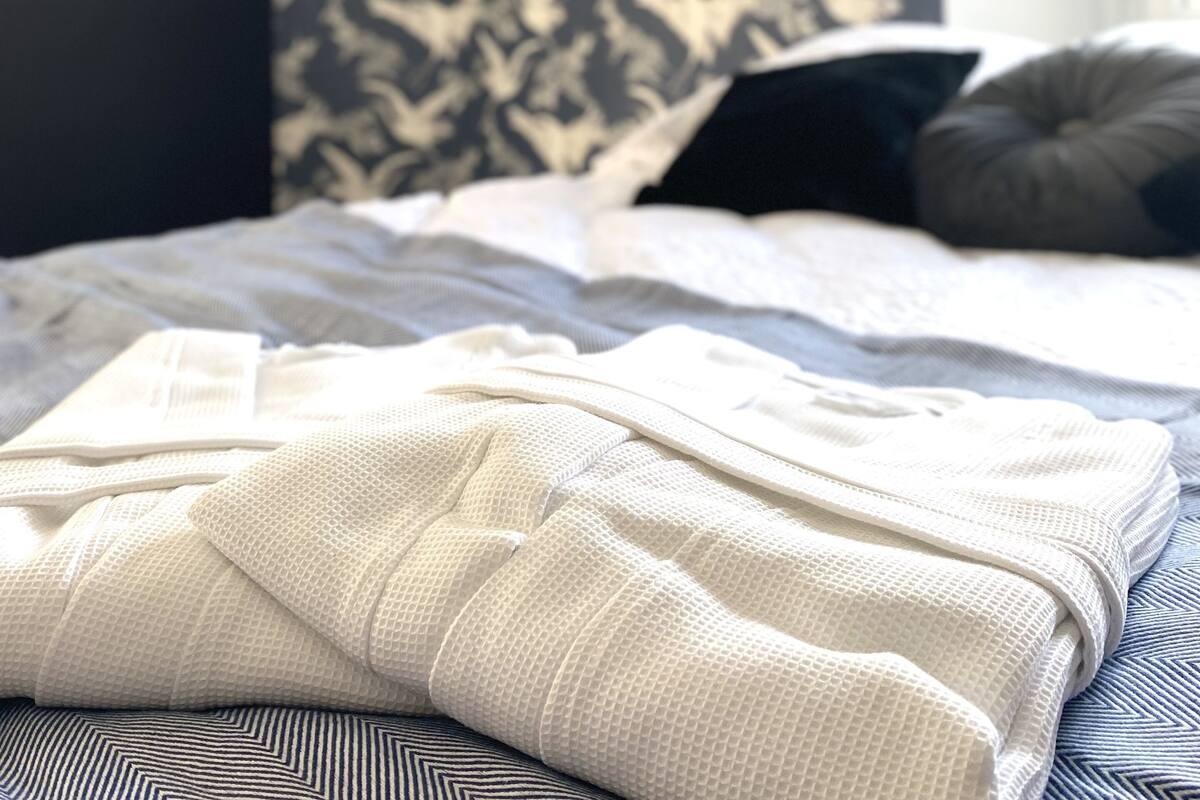 Premium bedding, pillow-top beds, free minibar, laptop workspace