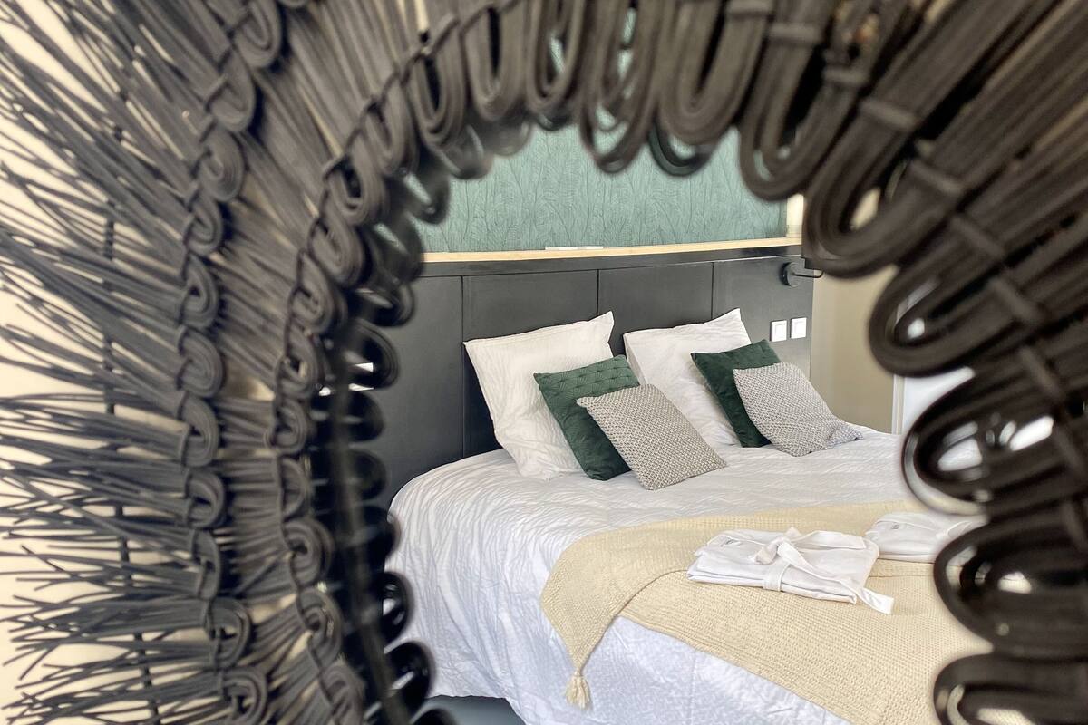 Premium bedding, pillow-top beds, free minibar, laptop workspace