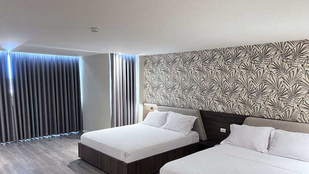 Habitación doble Deluxe | Escritorio, wifi gratis y ropa de cama 