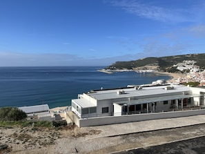 Enjoy expansive views of the sea and surrounding landscape from the hotel's large windows.