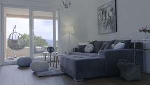 Apartamento Deluxe | Zona de estar