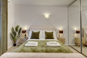2 habitaciones, tabla de planchar con plancha y cuna de viaje 