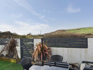 Terrace/patio - A lovely welcoming house with all the comforts of home. (Morfa Bychan)