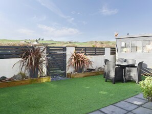 Outdoor dining - A lovely welcoming house with all the comforts of home. (Morfa Bychan)