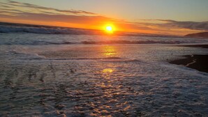 A beach with waves and a sunset. - Pure Nature, 3 kilometers away from Corcovado Park, La Leona Station (Playa Carate, Puntarenas)