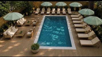 Outdoor pool, open 8:00 AM to 9:00 PM, pool umbrellas, pool loungers