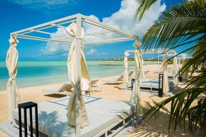 On the beach, sun-loungers, beach umbrellas, beach towels - Villa PM TCI, a 30,000sq/ft Mansion, Fully Staffed, includes Chef, Sleeps 18+ppl (Caicos Islands)