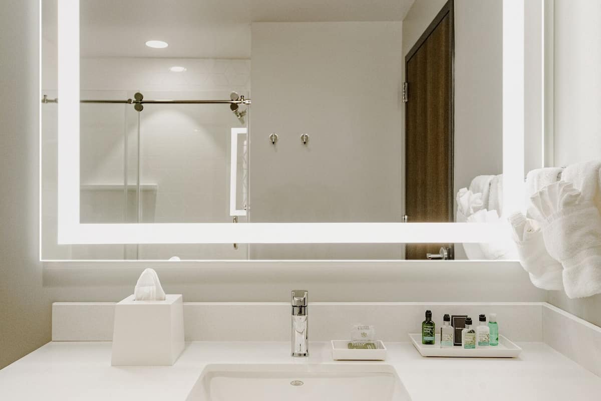 shower, designer toiletries, dressing gowns, towels