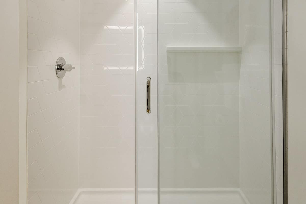 shower, designer toiletries, dressing gowns, towels