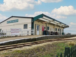 A railway station with a sign for Hayling Railway and Derek's Souvenir Shop. - 5 bedroom accommodation in Hayling Island (Hayling Island)