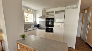 Fridge, microwave, toaster, cookware/dishes/utensils