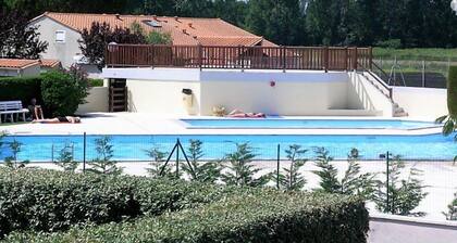 La Palmyre - LUMINEUSE VILLA mitoyenne - jardin clos - PISCINE COLLECTIVE