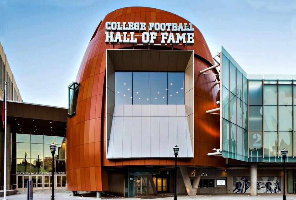 A building with a large sign reading "College Football Hall of Fame".