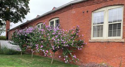 Exceptional location footsteps to beautiful downtown Mystic w/private driveway