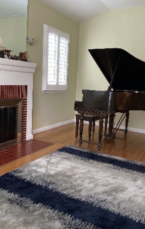Enjoy relaxing evenings by the fireplace, playing the piano, or gazing out the window.
