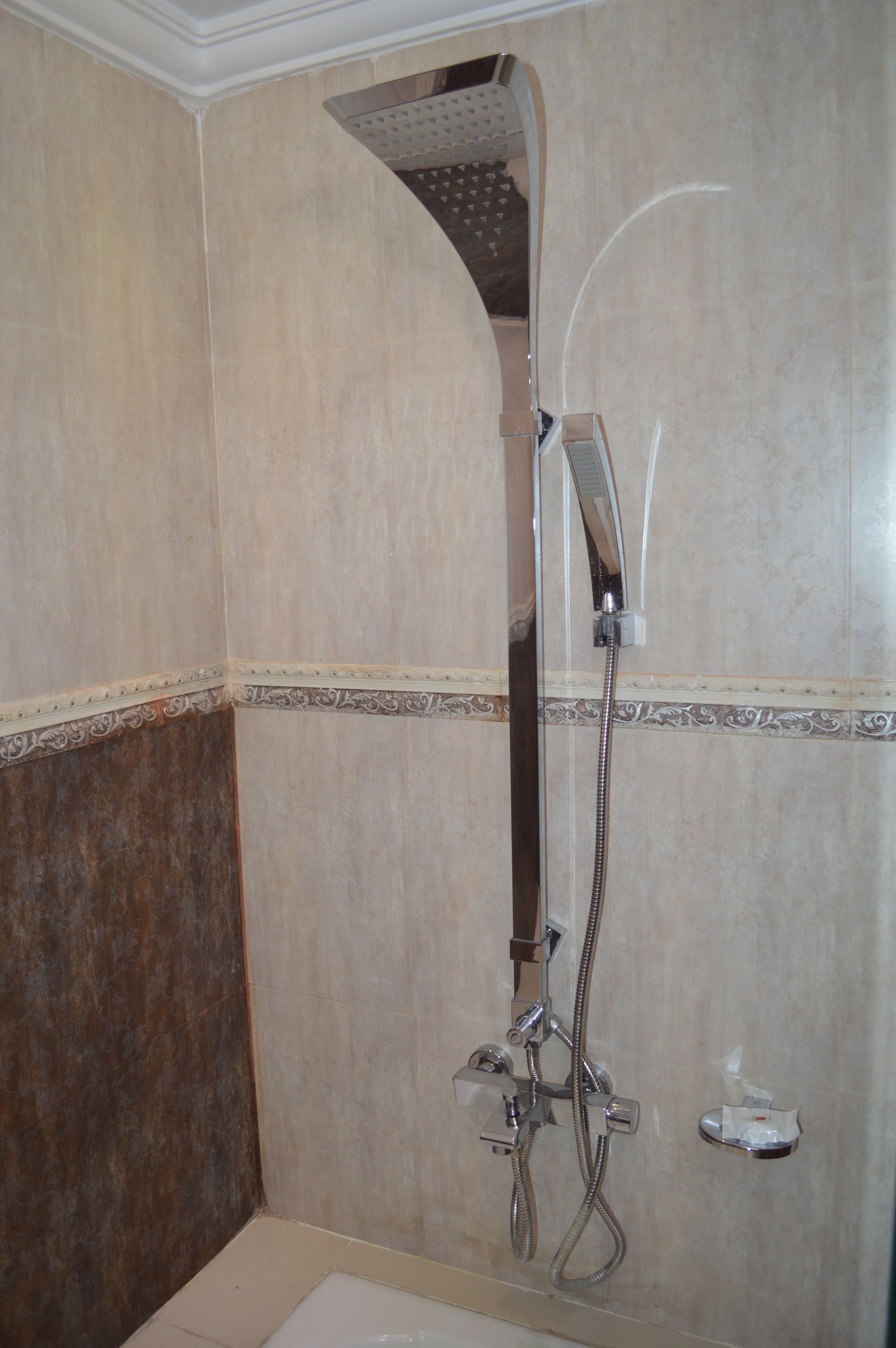 rainfall showerhead, hair dryer, dressing gowns, slippers