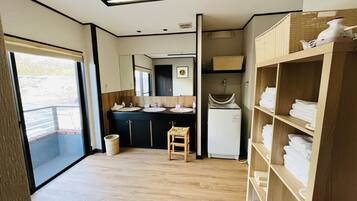 Rainfall showerhead, towels, soap, shampoo