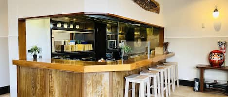 Fridge, microwave, electric kettle, cookware/dishes/utensils