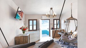 Studio Suite tiện nghi đơn giản, 1 giường cỡ king, bồn tắm nước nóng, quang cảnh biển | Khu phòng khách