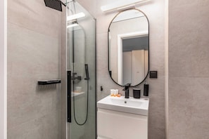 Bathtub, hair dryer, shampoo