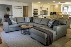 Smart TV, fireplace, books, stereo