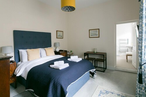 Luxury King bedroom with ensuite bathroom in a wing of a private Country House