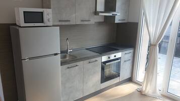 Studio Confort, 1 grand lit, terrasse