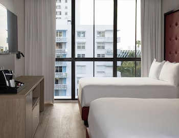 Premium Room, 2 Queen Beds | Egyptian cotton sheets, premium bedding, down comforters, minibar at UMA House by Yurbban South Beach
