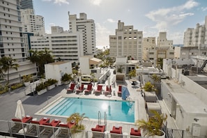 Outdoor pool, pool umbrellas, sun loungers