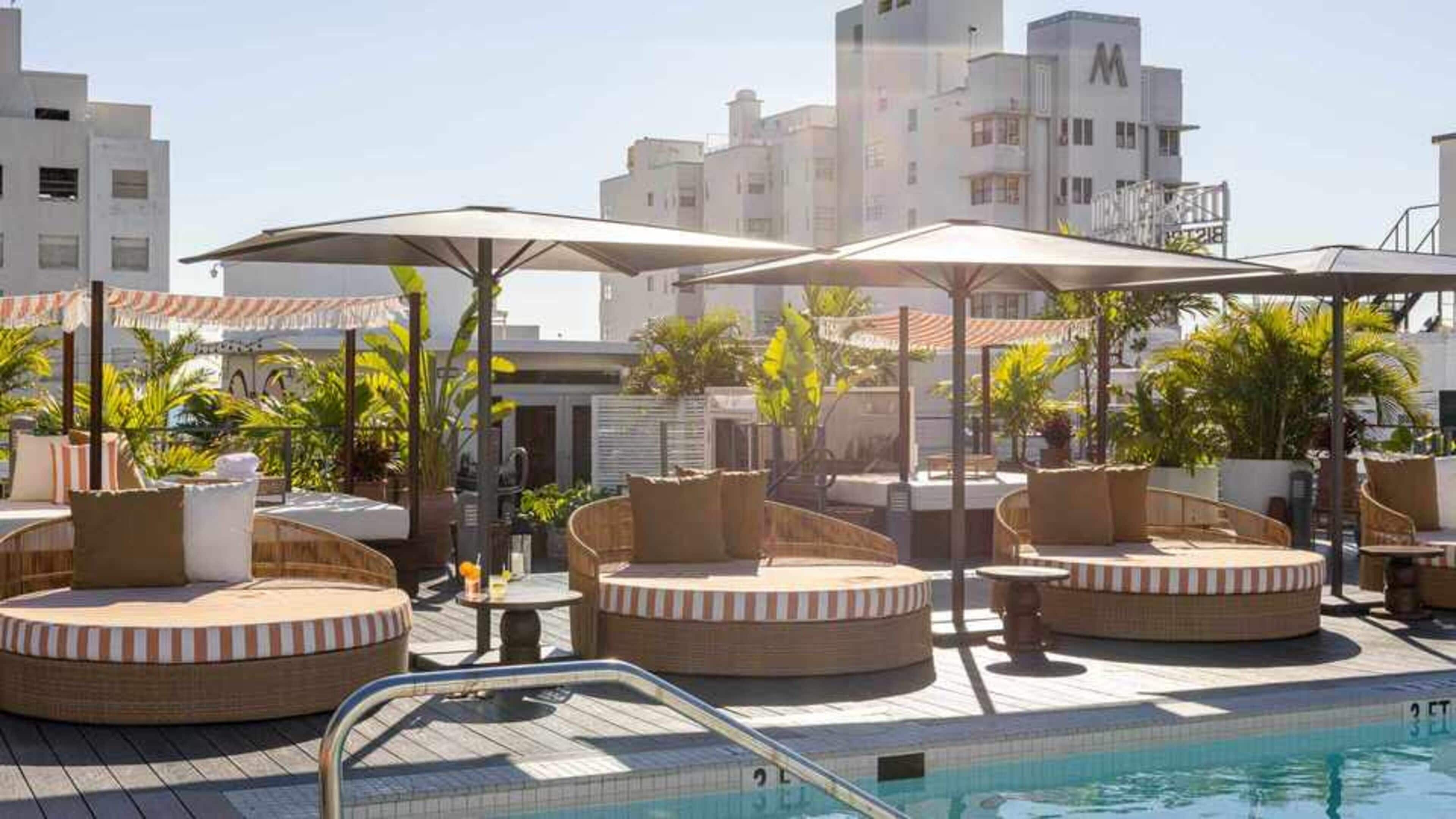 outdoor pool, pool umbrellas, pool loungers