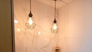 A corner dining area with two chairs, a table, and pendant lighting. - CASA MIRA DOURO marina beach 5mnts on foot caves, Porto bridge 5mnts by car (Vila Nova de Gaia)