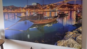 A large painting of a nighttime river scene with boats, a bridge, and buildings. - CASA MIRA DOURO marina beach 5mnts on foot caves, Porto bridge 5mnts by car (Vila Nova de Gaia)