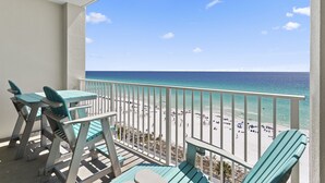 A balcony with a view of a beach. - Majestic Sun 807A - Panoramic Gulf Views, Indoor/Outdoor Pool, Hot Tub, Fitness! (Miramar Beach)