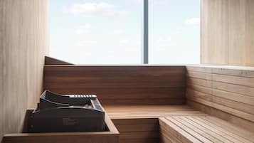 A sauna with wooden benches and a large window.