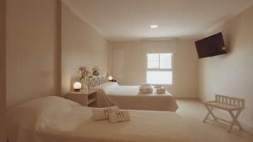 Triple Room | Down comforters, Select Comfort beds, bed sheets