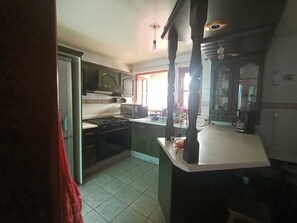 Fridge, microwave, oven, coffee/tea maker