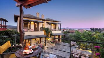 Habitación doble, vista al mar | Terraza o patio