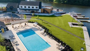 Outdoor pool, a heated pool - The Cove at Sylvan Beach - Pet friendly lakeside cottage with a pontoon boat! (Sylvan Beach)