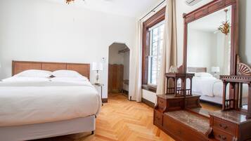 Walnut Room | Premium bedding, laptop workspace, blackout drapes, iron/ironing board
