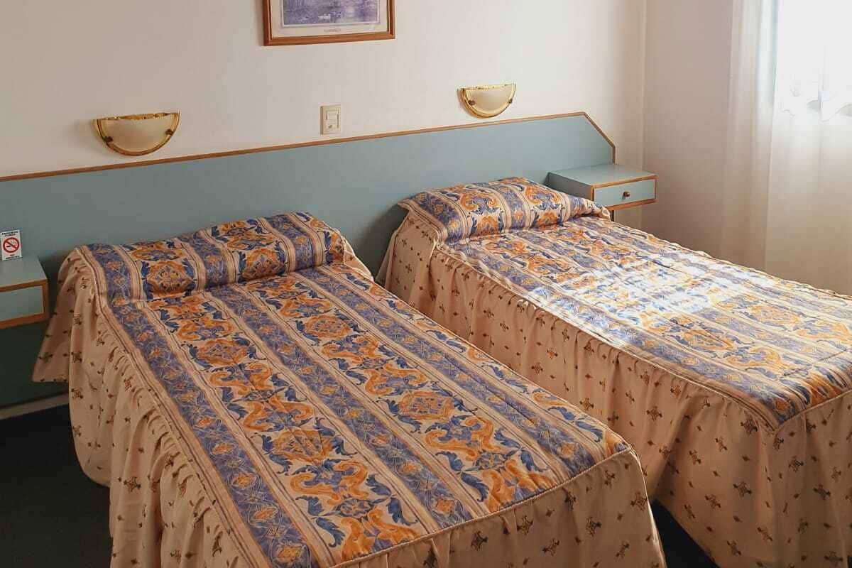 Basic Double or Twin Room, 2 Twin Beds | WiFi (free), bed sheets