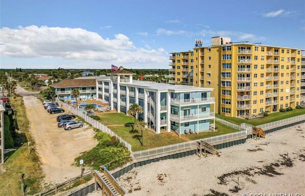 Aerial shot of the condo building (blue)