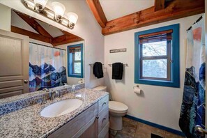 Combined shower/bathtub, hair dryer, towels, soap