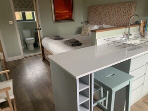 1 bedroom, desk, iron/ironing board, travel cot