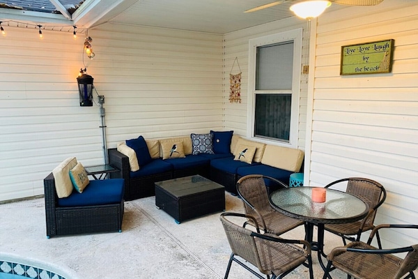 Enjoy Florida's night air, as you relax on the lanai