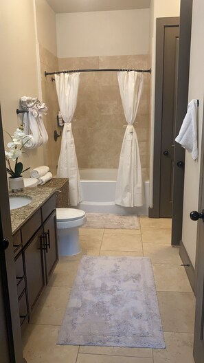 Combined shower/bathtub
